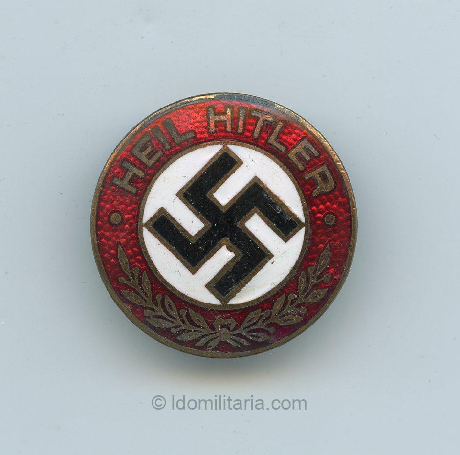 Rare NSDAP Heil Hitler slogan badge.
