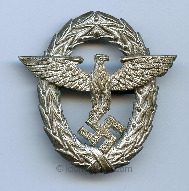 First pattern police cap eagle.