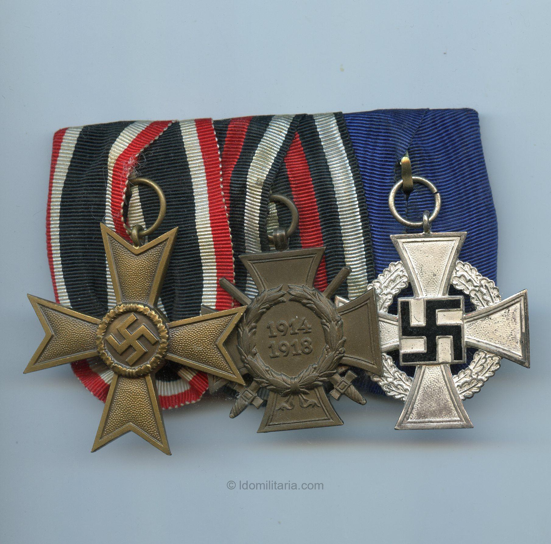Three piece medal bar with KVK 1st class, Hindenburg cross, 25 year loyal service medal