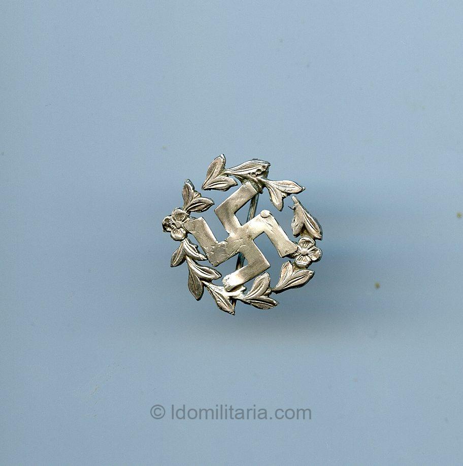 Hand made swastika broche